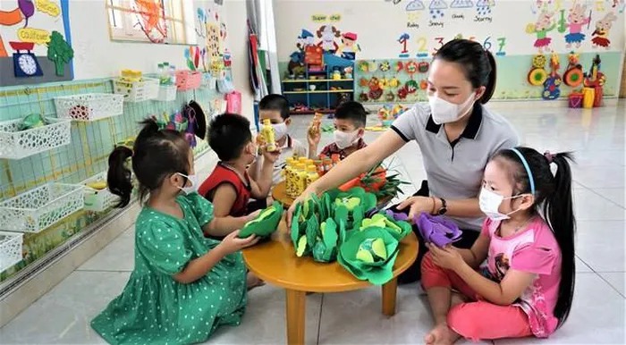 Kindergarten youngsters in Hanoi are about to return to highschool immediately