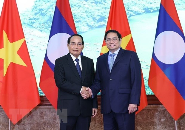 PM suggests bringing Vietnam-Laos economic cooperation on par with ...