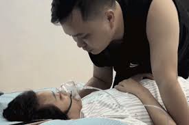 A Heartfelt Farewell: Husband Kisses Wife Goodbye in Hospital