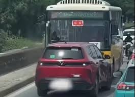 Car Driver Penalized for Illegal Overtaking in Hanoi