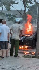 Car Catches Fire on Sidewalk in Ho Chi Minh City
