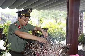 Police Department Honors Fallen Heroes with Flowers and Incense