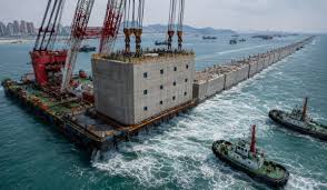 China Sinks 34 Concrete Buildings into Sea for Coastal Defense