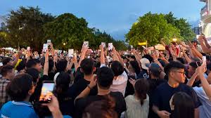 Crowds Gather Outside Huan Hoa Hong's Home Amid Controversy
