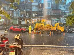 Heavy Rain Causes Traffic Chaos in Hanoi