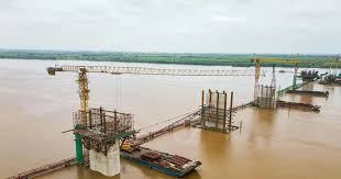 Nine Pillars of the Hong Ha Bridge Emerge in the Red River