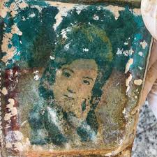 Photo of Woman Found in Wallet at War Martyr's Grave