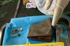 Photos Found in Soldier's Grave in Lam Dong