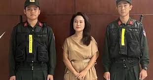 Singer Phuong Diem Huyen and Unicorn Media Director Charged
