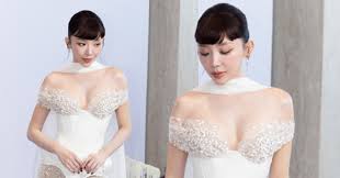 Tóc Tiên Stuns in Wedding Dress at Fashion Show
