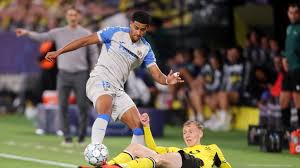 Borussia Dortmund Edges Villarreal 3-2 in Thrilling Match
