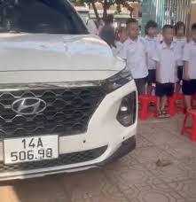 Deputy Principal Parks Car During Student Flag Ceremony