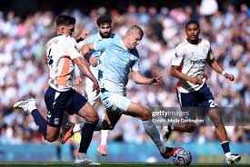 Manchester City Edges Coventry in Premier League Clash