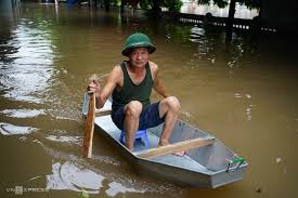 Severe Flooding in Hanoi: Residents Use Boats to Navigate Streets